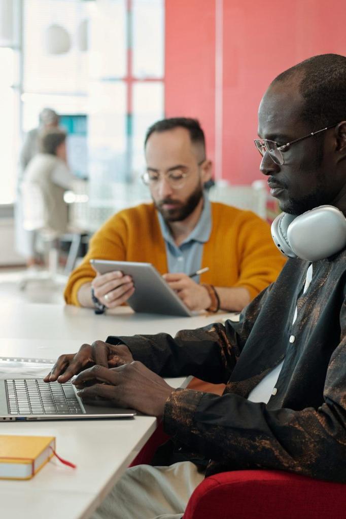 Colleagues participating in online training